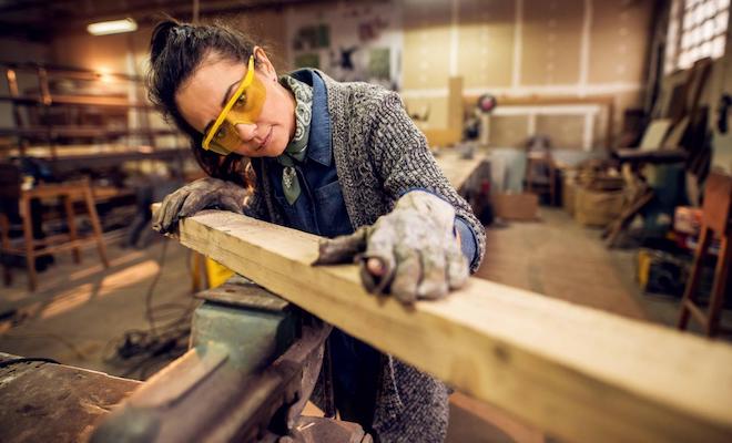 Female joiner working on a project
